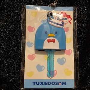 50th Anniversary Tuxedosam Key Cap Keychain. Limited edition brand new.